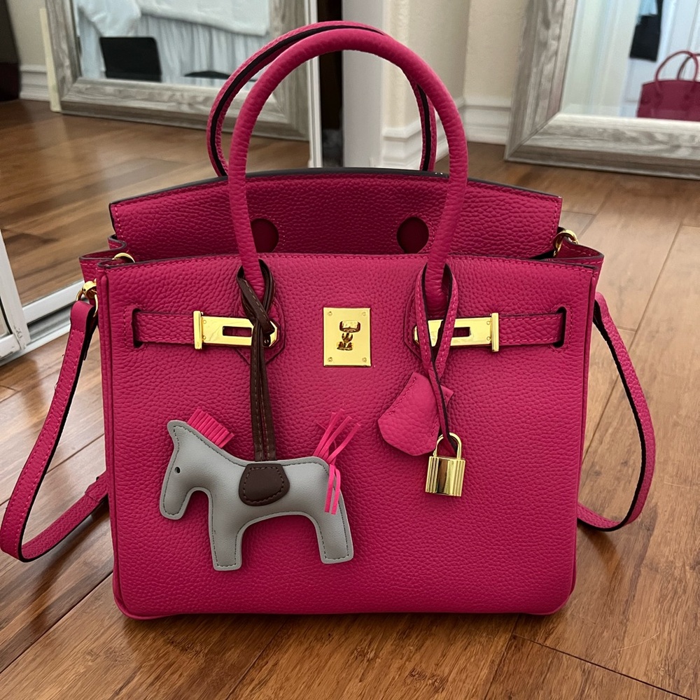Elegant Pink Handbag with Gold Accents